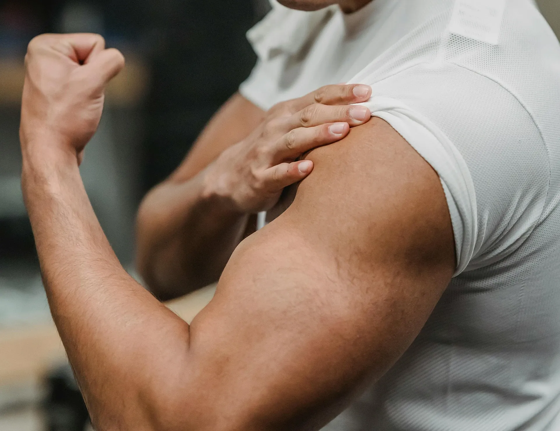 man showing biceps